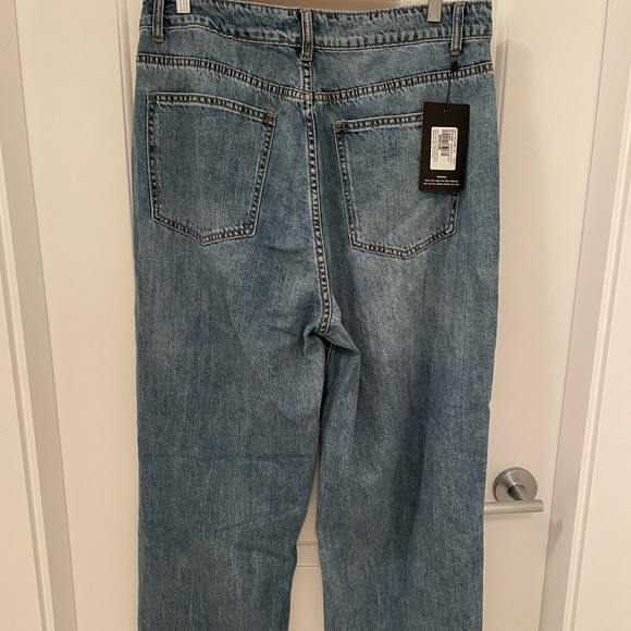 Size 12 Pretty Little Thing Mid Blue Wash Extreme Ripped Hem Boyfriend Jeans - Picture 8 of 9